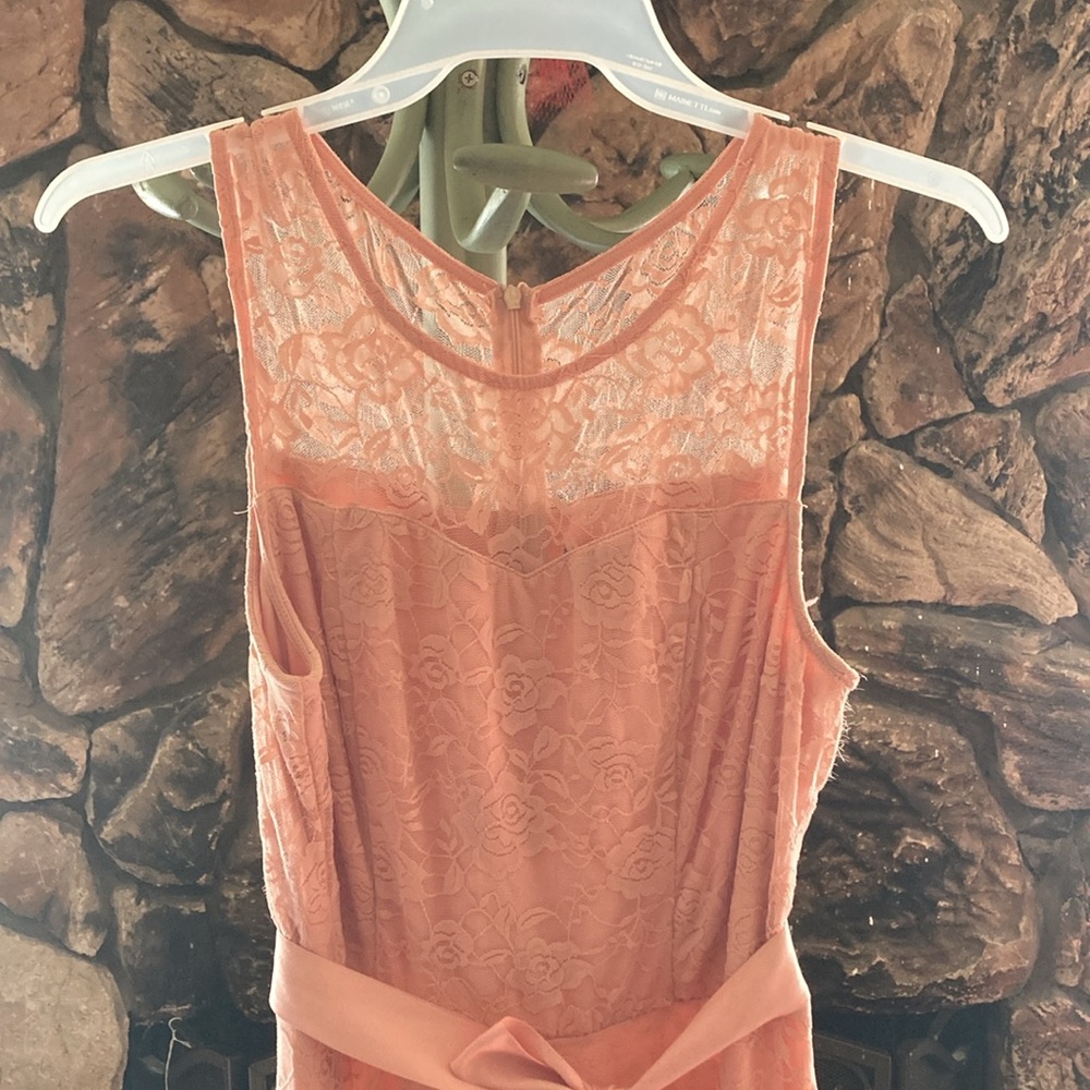Dressy star, Peachy/dusty rose color. Size XL